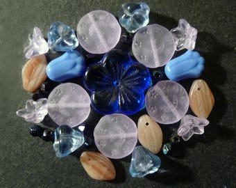30 mixed beige, blue, purple Czech glass beads.
