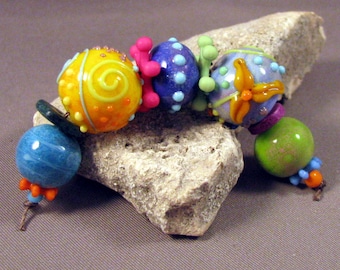 Handmade Lampwork Bead Set by Monaslampwork - Dots, Colors, and Enamels - Multiple dots and enamels, full of color Handmade by Mona Sullivan