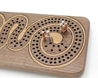 Cribbage Board - Walnut Wood with Cherry Curl. Personalize it with Optional Custom Engraving. Great Gift Idea. Made in the USA!