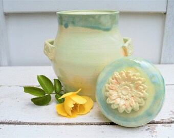 Yellow container with lid