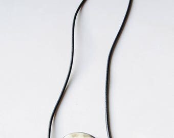 Expressive necklace with large horn pendant