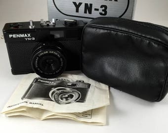 Pemex YN-3 35mm plastic toy camera with box, case and instructions