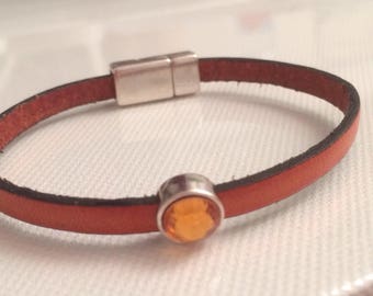 2 orange 5 mm leather bracelets