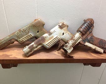 Antique Metal Toy Gun Set / Bell Pistol 1940s