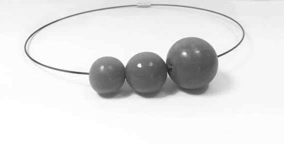Necklace Necklace Black wood with 3 different sized beads in gray