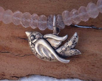 Ooak sterlng silver bird on a necklace of rose quartz