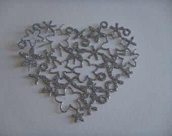 Heart shaped cutout flowers silver glitter