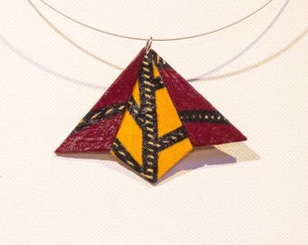 Geometric pendant in Burgundy and yellow African fabric