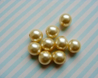 Set of 9 pearls ivory 8mm diam.