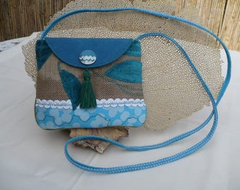 Small shoulder bag in fabric and leather