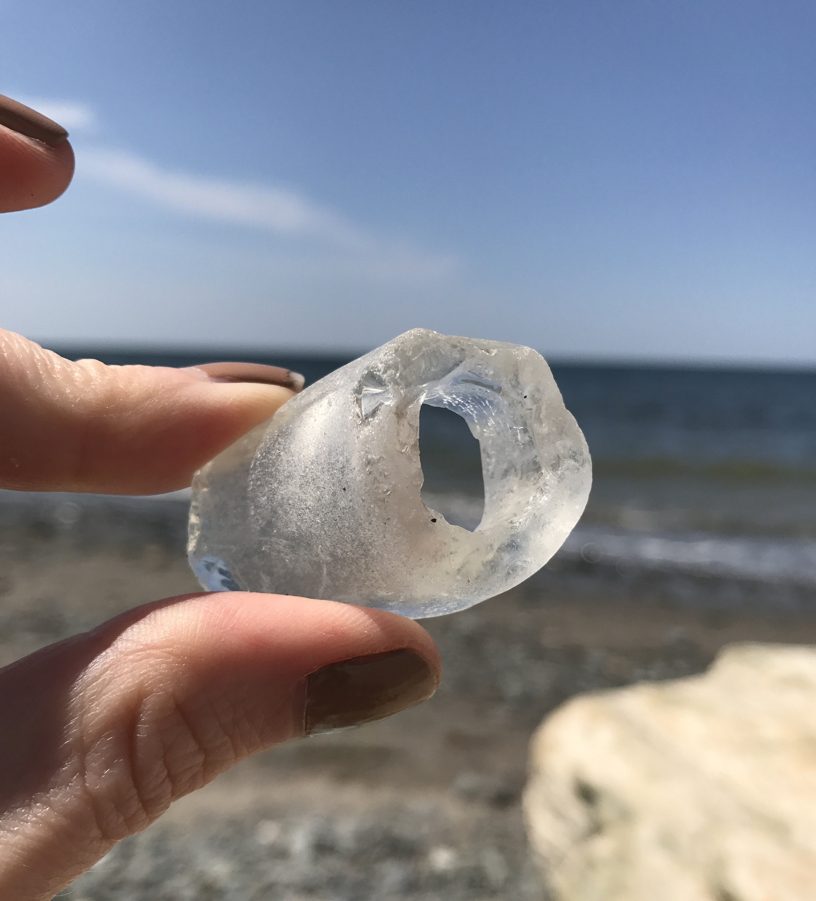 white bottle neck sea glass hunting in nova scotia