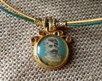 CHARMING Maharaja portrait on gold plated silver pendant .