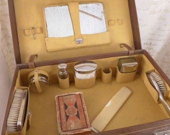 Men's shaving kit in a suitcase
