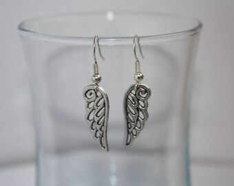 Fancy silver wing earrings