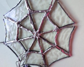 Stained glass spider's web, with spider, suncatcher