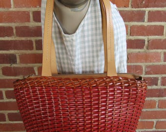 red woven leather bag