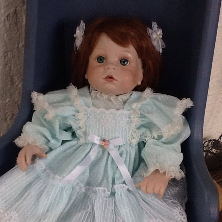 FabricBody Baby Doll. Porcelain head/hands.Handcrafted