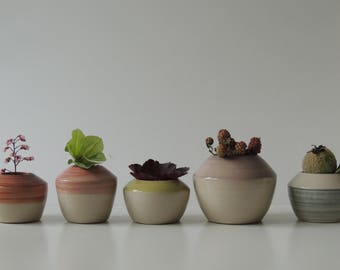 five ceramic vases 17-229