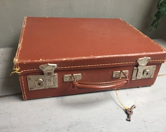 Small square suitcase, vintage, old luggage suitcase
