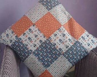 Tall tales, tangerine, orange, patchwork cushion