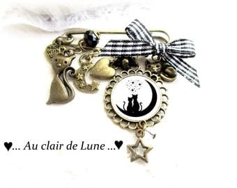 Broche style épingle à nourrice motif chat acier argenté