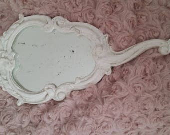 Beautiful hand mirror with baroque shabby