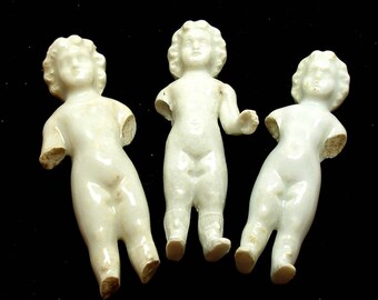 3 Frozen Charlotte dolls from Germany, antique porcelain, tall size. 2 1/2"-2 3/4"
