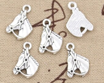 X 2 silver horse head Tibetan 17mm