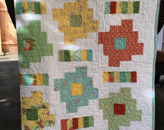 Baby quilt in red, yellow, green, turquoise, moda fabrics