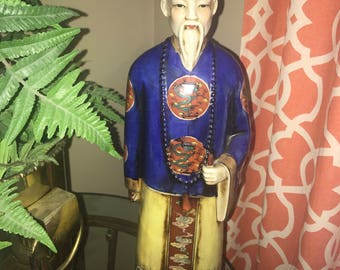 Asian man figurine