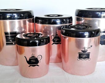 Vintage West Bend Copper Colored Canister Set Flour, Sugar, Coffee And Tea Plus The Matching Cookie Tin