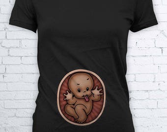 baby peeking out of belly shirt