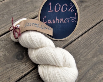 100% Cashmere White Heavy Lace Yarn. Over 1000 yards remainingl! Recycled yarn from a sweater. Perfect for dye base. Dyeable Fine yarn