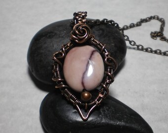 Beautiful mookaite jasper pendant wrapped in oxidized copper