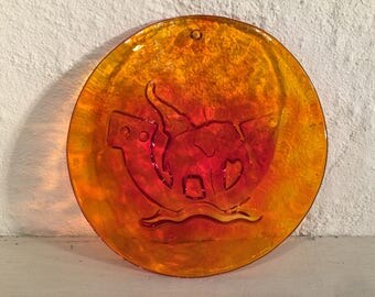 Suncatcher from Holmegaard glassworks, Denmark, yellow / orange glass from the Noah's Arc series with elephants, Michael Bang in 1969