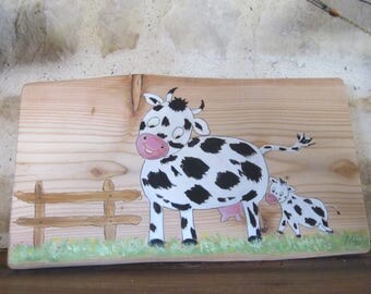 Cow and calf naive painting on wood