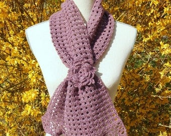 Purple crochet scarf and his little flower