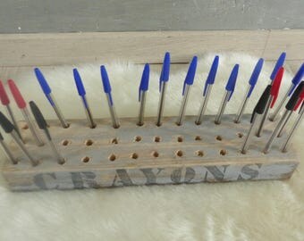 Original wooden pencil dispenser.