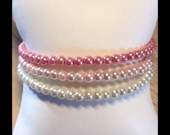 Bracelet triple strand glass bead memory.