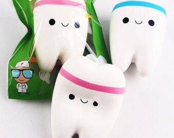 Jumbo Slow Rising Squishy Pink Tooth free with 2oz White Slime purchase