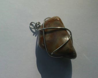 Brown marbled wire wrapped stone pendant on cord