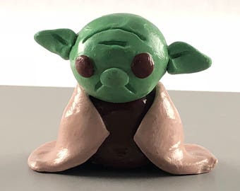 miniature yoda figurine