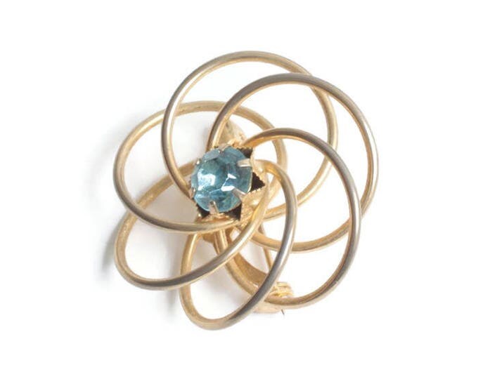 Aquamarine Glass Atomic Swirl Pin Gold Tone Dimensional Vintage