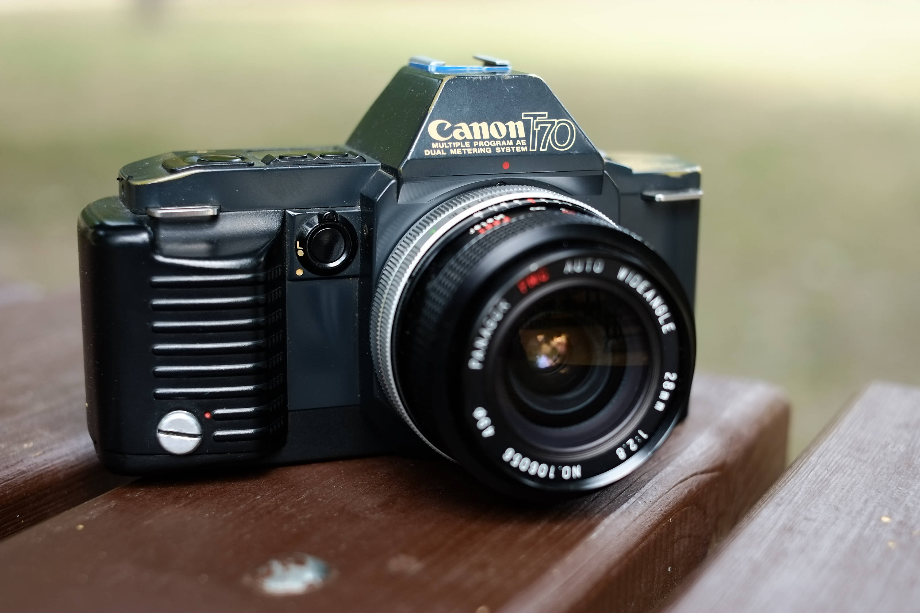 Beautiful Canon T70 Film Camera with 28 2.8 wideangle lens