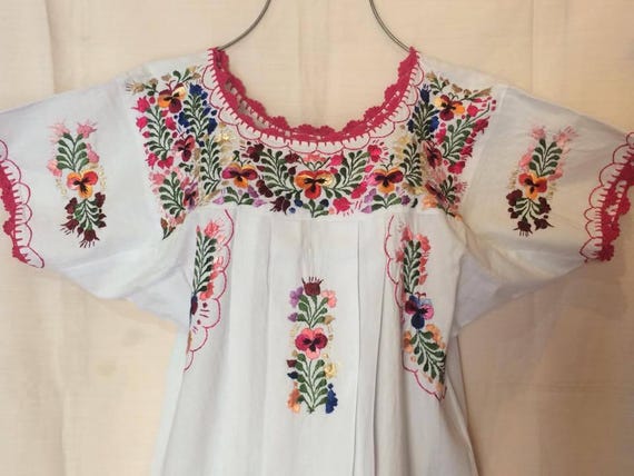 Hand made embroidery blouse by Oaxacan artisans from San