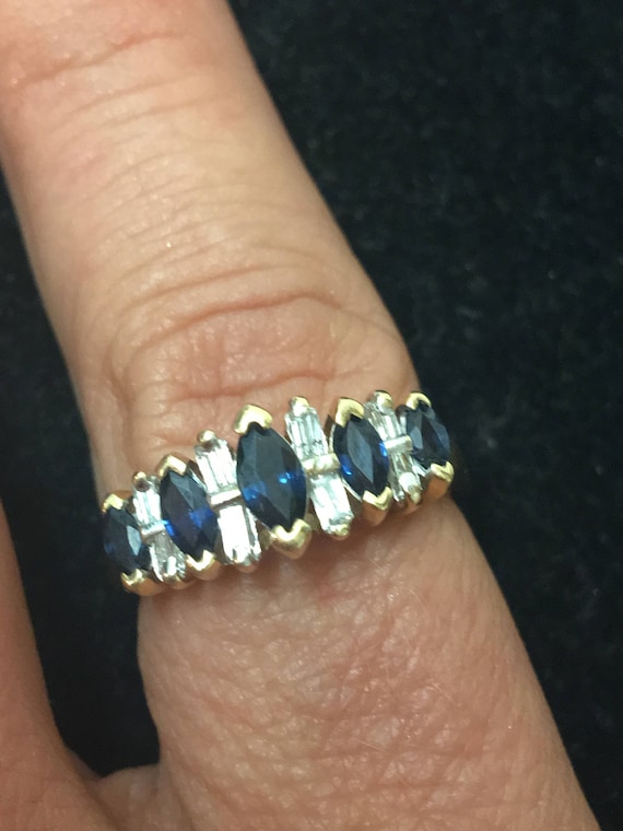 Stunning Baguette Diamond and Sapphire 14 KT Yellow Gold Ring