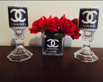 Custom designer Chanel candles and vase with flowers