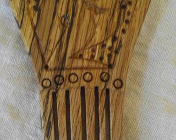 Wooden comb, spalted oak, based on Norse find