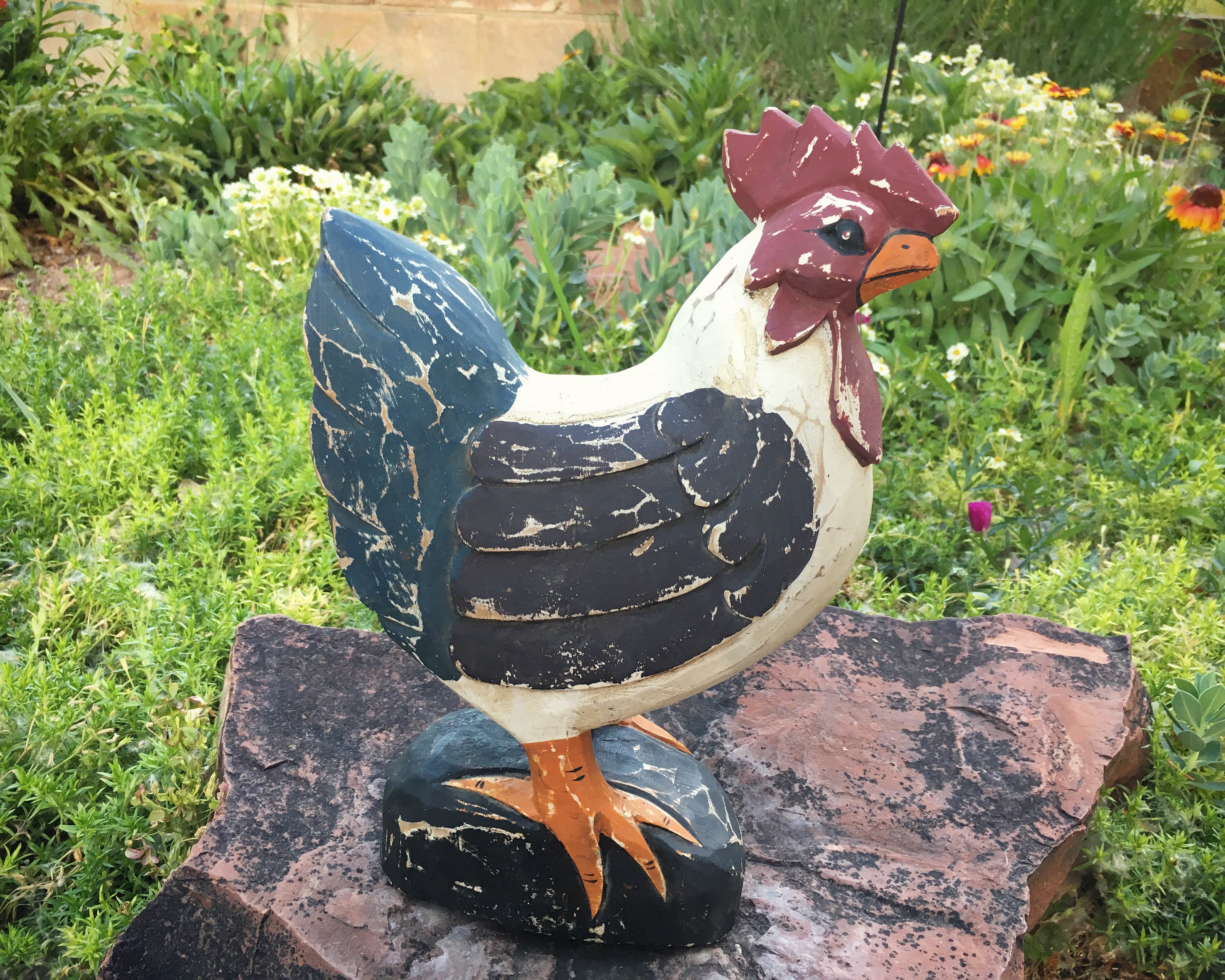 wooden rooster statue