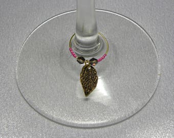 Wine Charms: Antiqued Gold Leaf Wine charms with Gold and Shiny Gray Bi-cone and Different Colored Seed Beads on Gold Wires